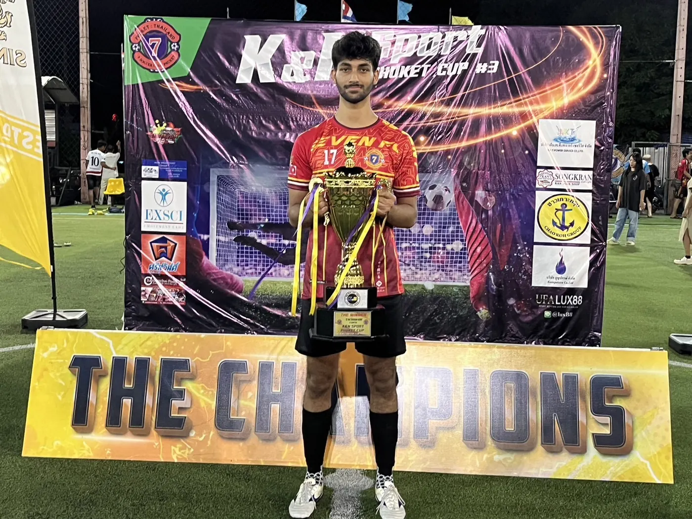 Champions photo with the team trophy